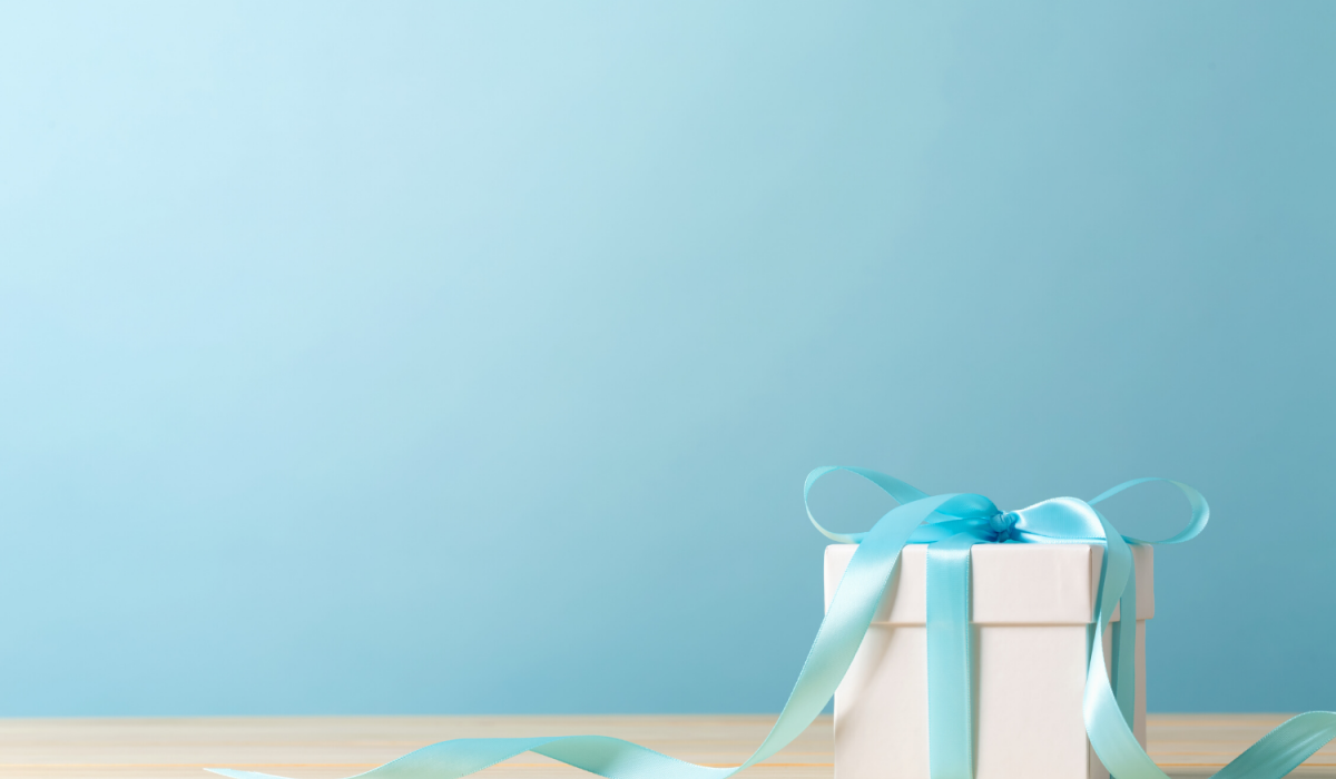 coddington-designs-marin-county-gift-guide-small-white-box-with-blue-ribbon