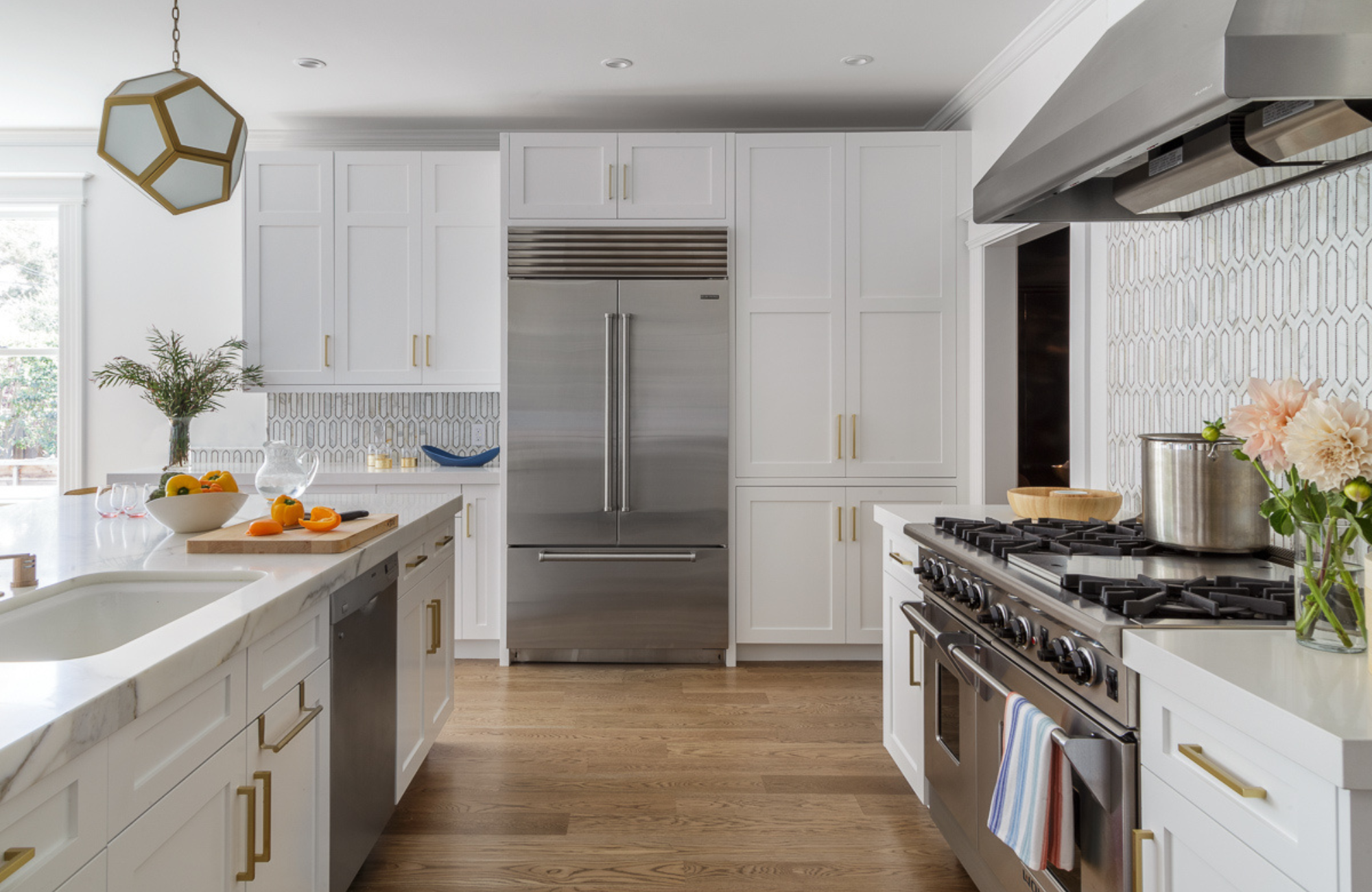coddington-design-bay-area-ca-selecting-quality-appliances-modern-kitchen-brass-accents-marble-counterrops