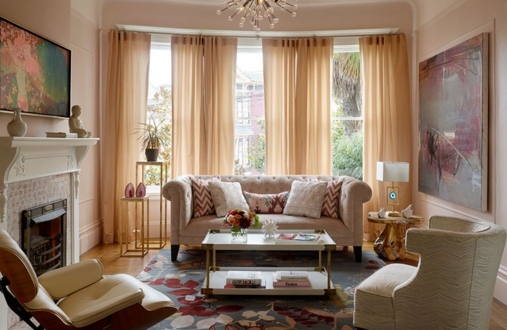 Coddington-Castro-Statement-Artwork-Pink-Millwork-Living-Room-Fireplace-Chandelier-Refined-Luxe-Interior-Design-Velvet-Sofa-Table-Artwork