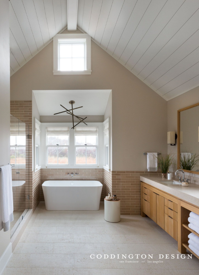 nantucket master bathroom bathtub modern light fixture shiplap ceiling contemporary look