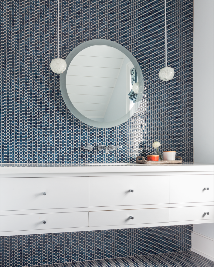 coddington-design-bay-area-ca-wall-decor-ideas-beach-house-bathroom-with-mounted-white-modern-vanity-circle-mirror-pendant-lighting-tiled-walls