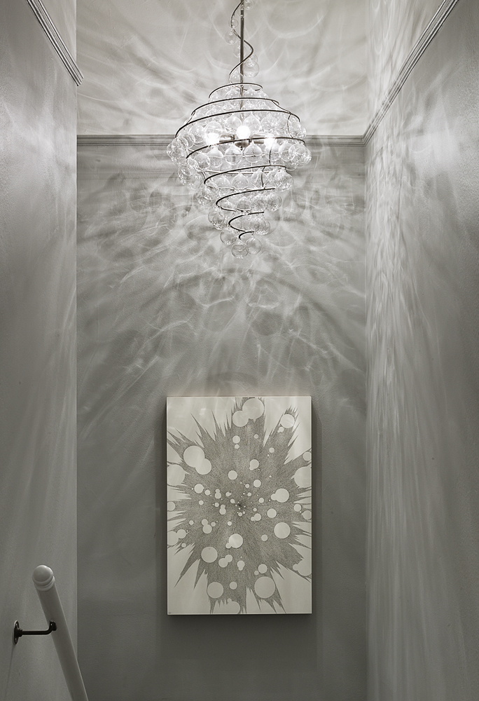 coddington-design-bay-area-ca-wall-decor-ideas-entry-way-with-chandelier-casting-artful-shadows-on-wall