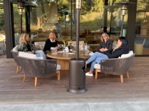 coddington-designs-bay-area-wine-country-retreat-staff-sitting-around-the-table-sipping-wine